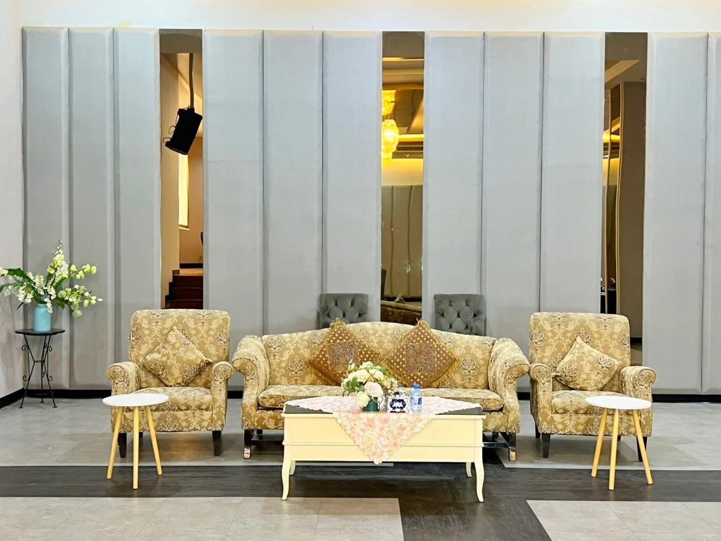VIP lounge seating with sofas in the ballroom foyer