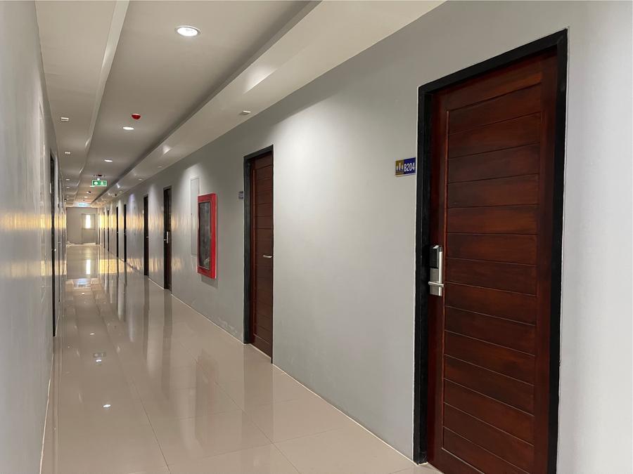 Guest corridor with wooden doors