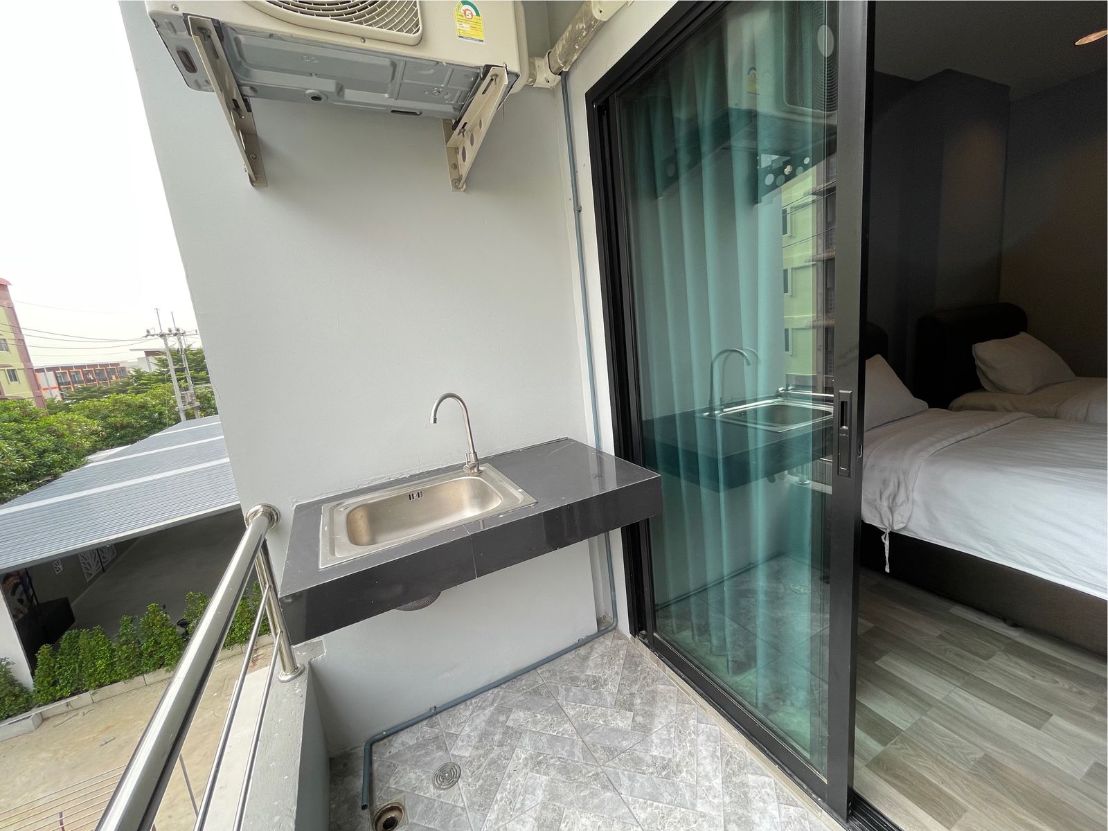 Private balcony with sink outside the room