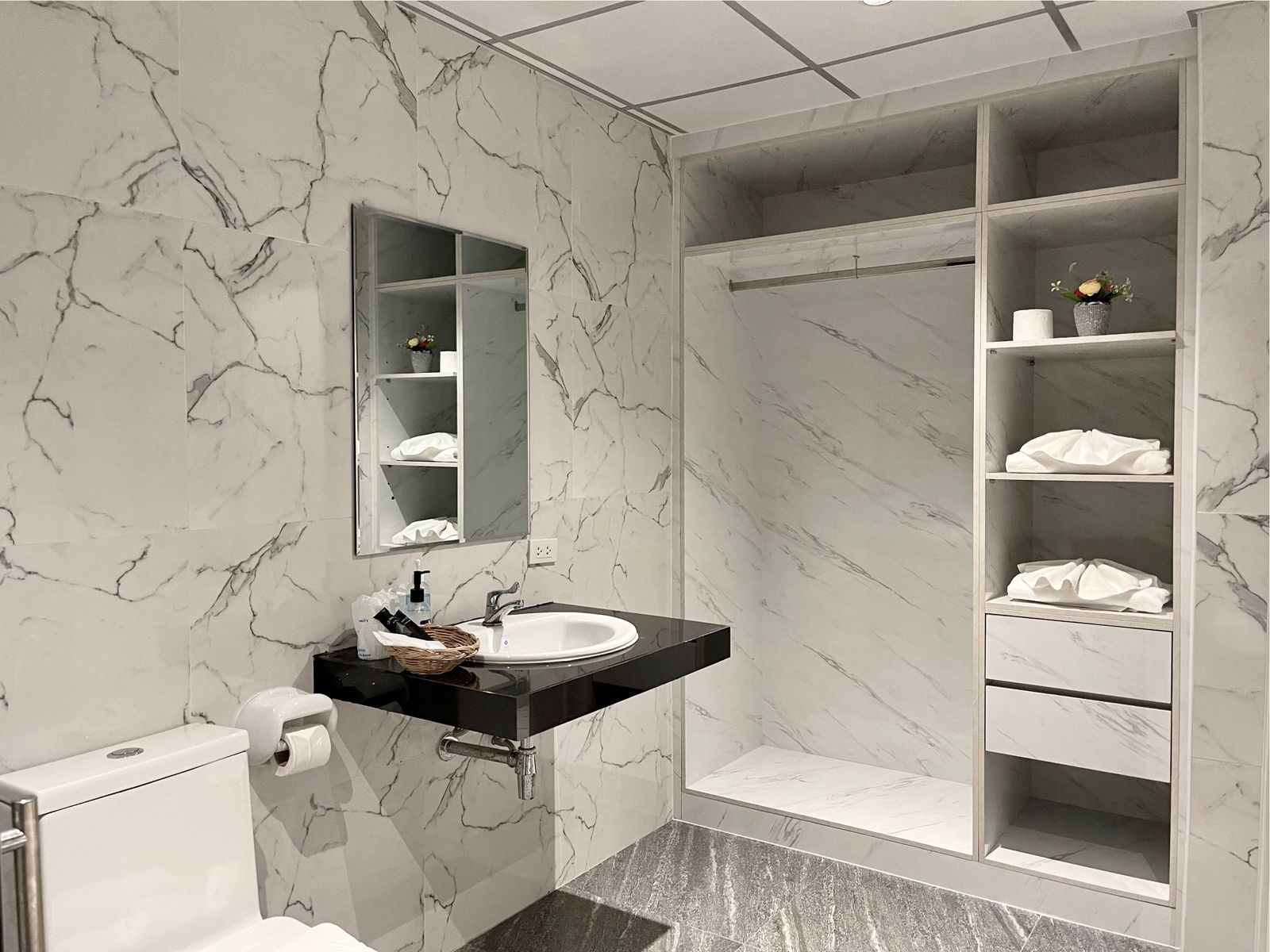 Marble vanity and open wardrobe
